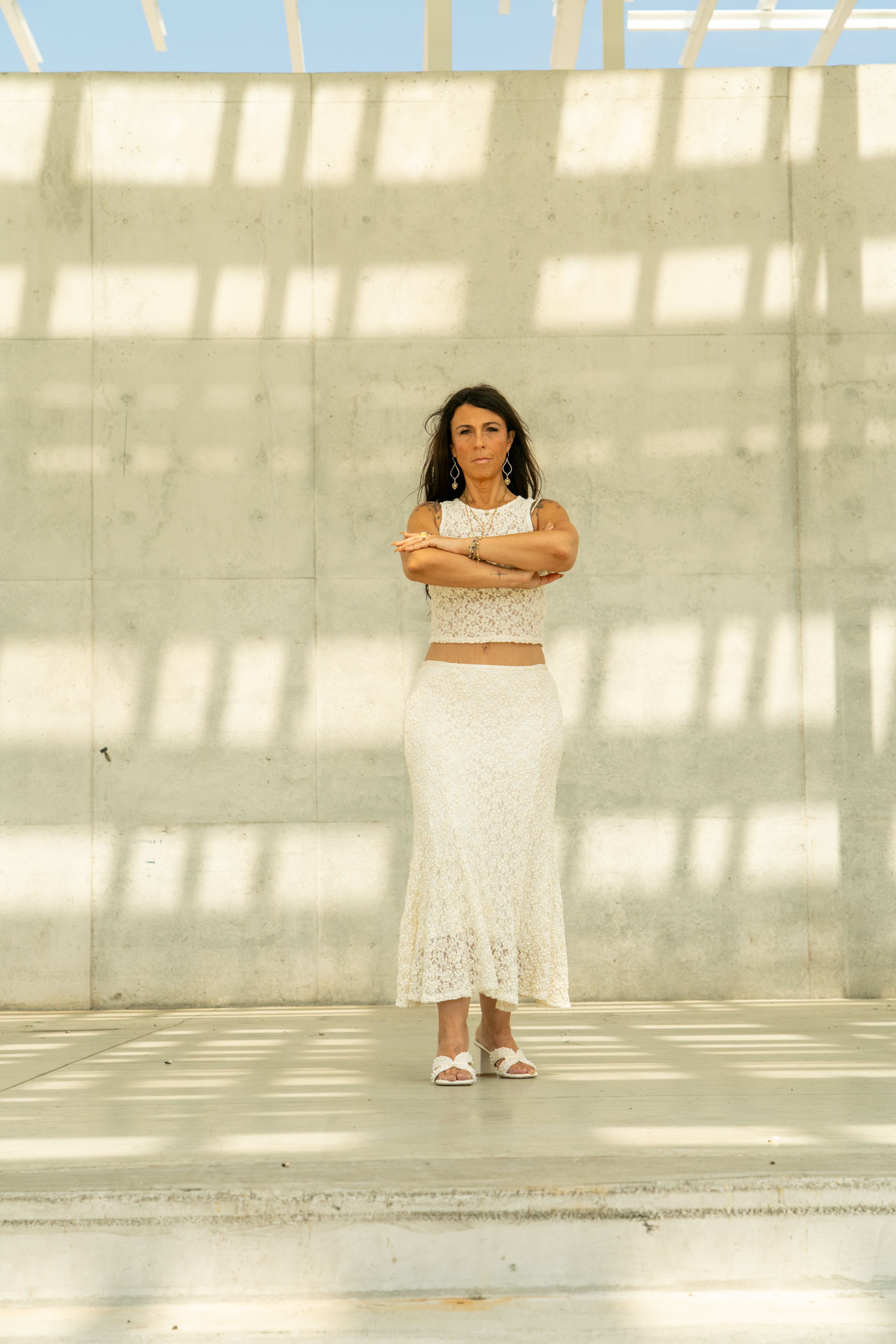 energetic medicine woman Audrey Love in a power pose on stage